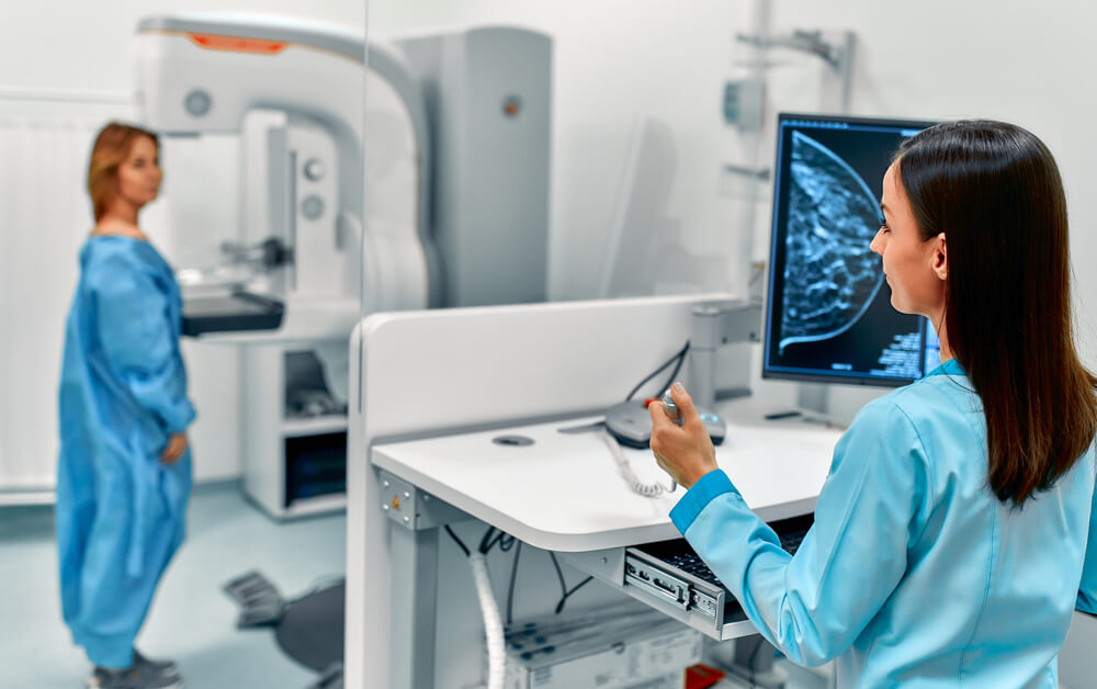 In the hospital, the patient undergoes a screening procedure for a mammogram, which is performed by a mammogram. A modern technologically advanced clinic with professional doctors.
