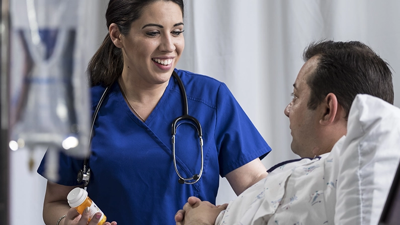 Physician giving instructions to hospital patient